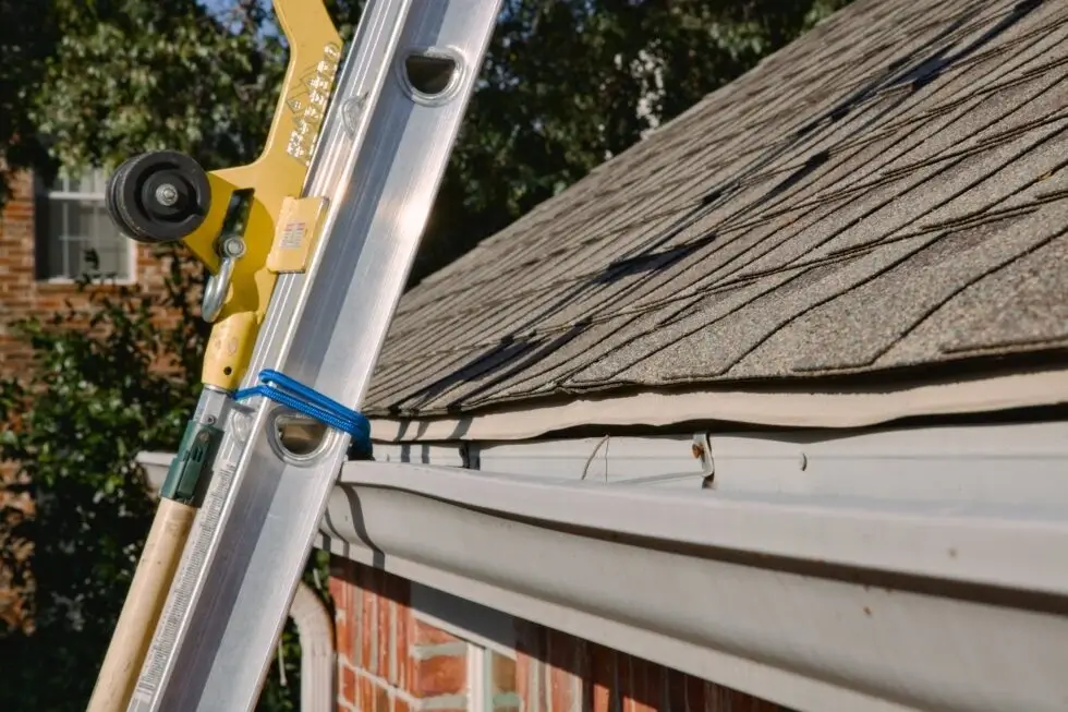 Patriot Claims ladder assist technician on roof supporting insurance adjuster inspection at PLRB 2026